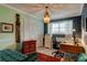 Well-lit office featuring ample workspace, stylish decor, and a large window at 4426 Saxon Dr, New Smyrna Beach, FL 32169
