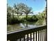 Scenic view of the water and foliage seen from the home's screened balcony at 4426 Saxon Dr, New Smyrna Beach, FL 32169