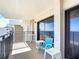 Relaxing balcony view of beach and ocean with seating at 4445 S Atlantic Ave # 804, Ponce Inlet, FL 32127