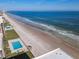 Gorgeous ocean view from condo complex, complete with a swimming pool and beach access at 4445 S Atlantic Ave # 804, Ponce Inlet, FL 32127
