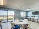 Comfortable community meeting room with coastal decor, tables, and chairs, perfect for gatherings at 4445 S Atlantic Ave # 804, Ponce Inlet, FL 32127