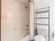 Bathroom featuring a tub with a shower, a toilet, and shelving unit at 448 Shorewood Ln, New Smyrna Beach, FL 32168