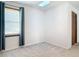 Bedroom featuring a window, skylight, neutral walls, carpet flooring and closet at 448 Shorewood Ln, New Smyrna Beach, FL 32168