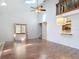 Bright living room with vaulted ceilings, skylights, and wood-look flooring at 448 Shorewood Ln, New Smyrna Beach, FL 32168