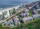 Aerial view highlighting location between beach and intercoastal with easy access to both at 4860 S Atlantic Ave # 1030, New Smyrna Beach, FL 32169