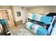 Charming bunk bedroom, perfect for guests or children, with ample closet space and a cozy decor at 4860 S Atlantic Ave # 1030, New Smyrna Beach, FL 32169
