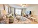 Comfortable living room with ample natural light, stylish furnishings, and a relaxing atmosphere at 4860 S Atlantic Ave # 1030, New Smyrna Beach, FL 32169