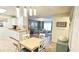 Open living space connecting the kitchen and living area, ideal for entertaining and everyday living at 4860 S Atlantic Ave # 1030, New Smyrna Beach, FL 32169
