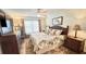 Inviting main bedroom with a comfortable bed, ceiling fan, and ample natural light, creating a restful retreat at 4860 S Atlantic Ave # 1030, New Smyrna Beach, FL 32169