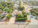 A well-maintained home with manicured landscaping, spacious driveway, and mature trees, offering a serene setting at 601 N Peninsula Ave, New Smyrna Beach, FL 32169