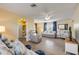 Inviting living room featuring tile flooring, a closet, and stylish furniture at 601 N Peninsula Ave, New Smyrna Beach, FL 32169