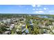 Breathtaking aerial view of the property showcasing its waterfront location, lush landscape, and the community at 61 E Bayshore Dr, Port Orange, FL 32127