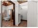 Walk in closet/dressing room with custom shelves and window at 61 E Bayshore Dr, Port Orange, FL 32127