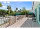 Outdoor deck overlooking garden and pool at 61 E Bayshore Dr, Port Orange, FL 32127