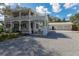 Beautiful two-story home with a large front porch and detached garage at 622 Faulkner St, New Smyrna Beach, FL 32168