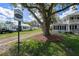 Charming neighborhood street view featuring well-maintained homes and mature trees at 622 Faulkner St, New Smyrna Beach, FL 32168