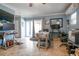Cozy living area featuring tile floors, ample natural light, and comfortable furnishings at 6531 Turtlemound Rd, New Smyrna Beach, FL 32169