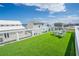 Enjoy ocean views from this rooftop deck with artificial turf and comfortable outdoor seating at 6531 Turtlemound Rd, New Smyrna Beach, FL 32169