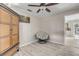 Bedroom featuring modern flooring, a ceiling fan, and natural lighting from the window at 701 Kristina Ct, Port Orange, FL 32127