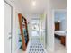 Bright entryway with views into the bedroom and out to the front yard at 751 Pine Shores Cir, New Smyrna Beach, FL 32168