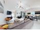 Spacious living area flowing into a modern kitchen, offering an open and airy design at 751 Pine Shores Cir, New Smyrna Beach, FL 32168