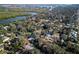 Aerial view of a residential area showcasing the property's surroundings, river, and Canal Street at 820 Faulkner St, New Smyrna Beach, FL 32168