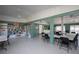Community clubhouse featuring a large communal space with tables, chairs, and a library at 848 Pine Shores Cir, New Smyrna Beach, FL 32168