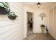 Inviting entryway with neutral walls and decor leading to the living spaces at 848 Pine Shores Cir, New Smyrna Beach, FL 32168