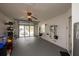 Well-lit garage with storage and a utility sink featuring an open garage door at 848 Pine Shores Cir, New Smyrna Beach, FL 32168