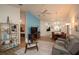 Cozy living room featuring modern decor, open layout, and view into the dining area at 848 Pine Shores Cir, New Smyrna Beach, FL 32168