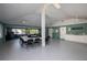 Spacious community meeting area includes tables and a kitchenette at 848 Pine Shores Cir, New Smyrna Beach, FL 32168
