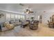 Comfortable living room featuring tile floors and a ceiling fan at 921 Duncan Rd, South Daytona, FL 32119