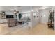 Bright living room with neutral tones, tile floors, and a comfortable seating arrangement at 921 Duncan Rd, South Daytona, FL 32119