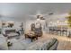 Open-concept living room seamlessly flows into the dining and kitchen areas at 921 Duncan Rd, South Daytona, FL 32119