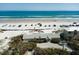 Aerial view showcasing this beachfront home's location and proximity to the ocean at 921 N Atlantic Ave, New Smyrna Beach, FL 32169