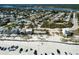 Expansive aerial view of beach homes, coastal community and ocean waters at 921 N Atlantic Ave, New Smyrna Beach, FL 32169