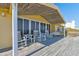 Expansive back porch with ample seating and stunning ocean views, ideal for entertaining at 921 N Atlantic Ave, New Smyrna Beach, FL 32169