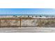 Inviting beach view from a deck with wooden railing at 921 N Atlantic Ave, New Smyrna Beach, FL 32169