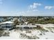 Beach home with light yellow paint, elevated porch and beach access at 921 N Atlantic Ave, New Smyrna Beach, FL 32169