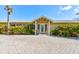 Charming beachfront home with a welcoming front entrance and beautiful landscaping at 921 N Atlantic Ave, New Smyrna Beach, FL 32169