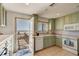 Kitchen features modern appliances, ample counter space, and a view of the beach at 921 N Atlantic Ave, New Smyrna Beach, FL 32169