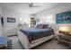 Bright bedroom with nautical theme, white furnishings, and tiled flooring at 923 Locust St, New Smyrna Beach, FL 32169