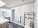 This renovated bathroom includes double sinks, a toilet, and a towel rack at 950 Sand Crest Dr, Port Orange, FL 32127