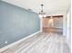 Bright dining room features grey accent wall at 950 Sand Crest Dr, Port Orange, FL 32127