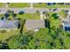 Birds eye view of the home showing the roofline, yard and adjacent neighborhood at 1039 Beulah Dr, Edgewater, FL 32132