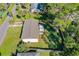 Aerial view of the home showing the roofline, yard and adjacent neighborhood at 1039 Beulah Dr, Edgewater, FL 32132