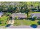 Aerial view of the property showcasing a well-manicured lawn and convenient street access at 1039 Beulah Dr, Edgewater, FL 32132