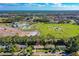 Aerial view of the neighborhood highlighting the home's proximity to a community park, sports fields, and the ocean at 1039 Beulah Dr, Edgewater, FL 32132