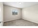 Bright bedroom with neutral carpet and a window with blinds at 1043 Beulah Dr, Edgewater, FL 32132