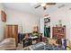 Bedroom with a window, a ceiling fan, and an open closet at 1043 Beulah Dr, Edgewater, FL 32132